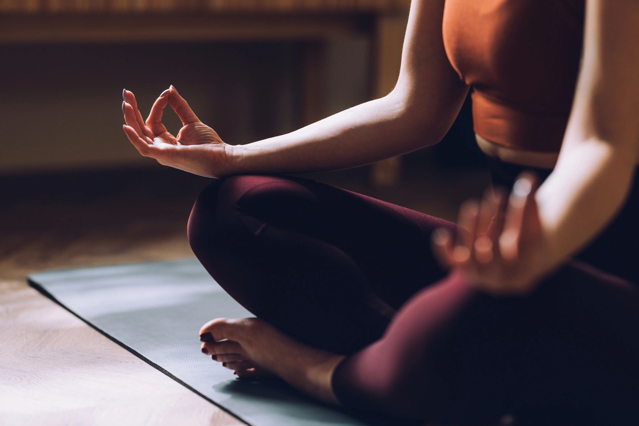 Close-up of hands in meditation, symbolizing energy healing and calm